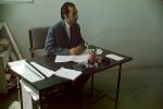 Teacher, Man, Male, Table, Chair, Sitting, Classroom, Schoolroom, Desk, Afghanistan, 1974, 1970s, KEDV04P11_19