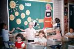 The Sun, sunshine, Girls, Boys, desk, books, Classroom, 1960s, KEDV05P07_19