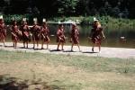 Schoolkids marching as American Indians, lake, KEDV05P10_04