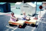 Girls, Crosswalk, Sidewalk, Schoolhouse, Pedal Car, July 1984, 1980s, KEPV01P03_07