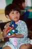 Girl, face, Hispanic, toy tractor, classroom, KEPV01P05_07