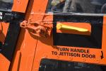 Turn Handle to Jettison Door, US Coast Guard, HH-65 Dolphin, USCG, MYCD01_043
