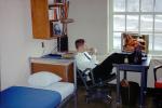 Coast Guard Man sitting and contemplating, Playboy Centerfold, bed, desk, chair, March 1970, 1970s