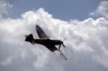 Spitfire in flight, airborne, clouds