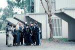 Police arrest a boy, handcuffed, Policeman, Operation Kernel Blitz, urban warfare training