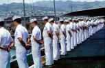 Sailors Lining up as USS Ranger prepares to leave harbor in Honolulu, Pearl Harbor, MYNV04P13_06