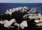 Intruders and Tomcats resting, A-6, F14, parked on the Bow
