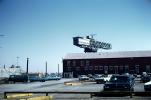Cars, Navy Yard, giant crane, 1960s
