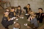 Cub Scouts eating cuocakes, Basement, Goys, 1950s, MYSV01P04_18