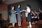Girl Scouts receiving badges, MYSV01P06_17