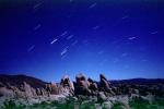 Rocks, Stone, Boulders, spinning stars, night sky, NPSV01P10_18