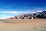Woman sitting, Sand Dunes, Death Valley National Park, Panamint Mountain Range, NPSV01P14_02