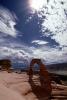 Delicate Arch, Stone, Rock, Clouds, sun, Arches National Park, geologic feature, geoform, NSUV06P06_16