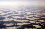 Pancakes floating in the sky, flying over the midwest USA during the winter, daytime, daylight, NWSV21P02_05