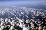 flying over the midwest USA during the winter, daytime, daylight, cumulus puffs, NWSV21P03_15