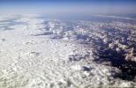 flying over the midwest USA during the winter, daytime, daylight, cumulus puffs, NWSV21P03_16