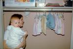 Mom at Babies Closet, Clothes, funny, laughing, cute, dress, 1950s