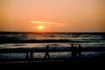 People walking, beach, sand, Pacific Ocean, sunset, waves