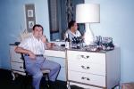 Hotel Room Party, Booze, Man, Desk, Mirror, Lamp, Furniture, lampshade, 1950s, PARV01P06_04
