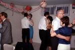 Couples dancing into the night, basement, 1960s