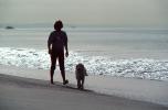 Man and his Dog on the Beach. samd. Pceam. water, PBAV01P05_11