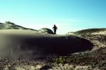a person on a dune, sand, PBAV02P03_07