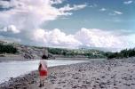 Rio Grande River, Texas, Beach, rocks, stones, clouds, woman, shorts