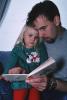 Father, Daughter, reading a book