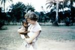Missionary Woman Holds Baby, 1940s, PBTV05P02_12