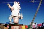 upside-down doll, clothesline, clothespins