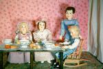 Heidi notices roll by plate, dinner, string puppets, diorama, 1950s