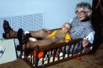 Grandma with Baby Girl, crib, PCFV03P03_05