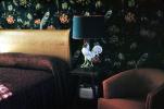 Bed, Rooster, Lamp, Pillow, Chair, dark wallpaper, 1950s