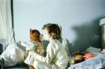 Girl with her Teddy Bear, Bed, sheets, 1950s, PDBV02P03_01