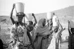 Woman carry's water bucket, Somalia Refugee Camp, PDC35V07P36_341