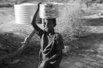 Girl carry's water bucket, Somalia Refugee Camp