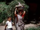 Woman Carrying a bushel, Boral Village, Gujarat, PDCV01P03_09