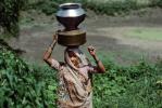 Woman Balances Metal Water Containers, Bayad Taluka, Gujarat