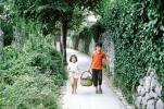 girl and boy carrying a basket, path, Ivy