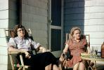 Women, Chairs, Relaxing, Larchmont, New York, home, house, door, dresses, glasses, 1947, 1940s