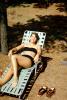 Woman, Tan, Bikini, Sun Worshipper, Lounge Chair, feet, legs, August 1963, Cape Cod, Massachusetts, 1960s, PDEV01P02_19