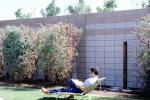 Backyard, Lounge Chair, rock garden, wall, man, male, reading, relaxing, PDEV01P05_10