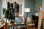 Television, chair, curtains, 1950s