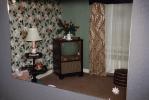 Television, lamp, lampshade, flowery Wallpaper, floral wall, flower, drapes, mirror, 1950s