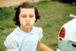 Girl making faces, 1950s, PDGV01P08_14