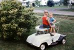 Boys on a lawnmower, PDGV01P09_14