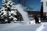 Man Snow Blower, clearing snow, 1960s