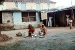 Woman washing dishes, pail, pots, pans, PDKV01P01_09