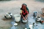 Woman washing dishes, pail, pots, pans, PDKV01P01_10