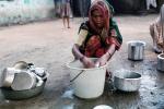 Woman washing dishes, pail, pots, pans, PDKV01P01_11